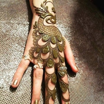 creative backhand mehndi design ideas