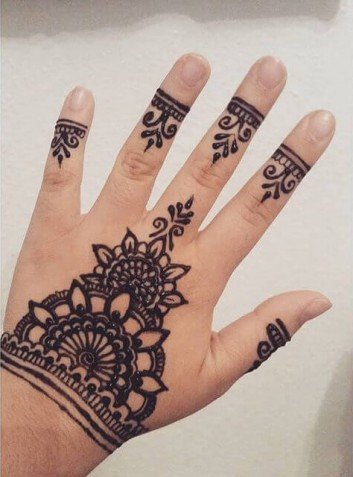 beautiful hands with elegant mehndi