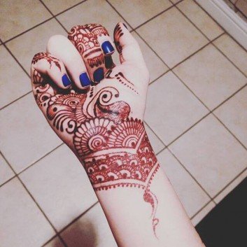 Purple Henna design for front hands