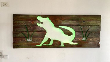 Pallet glowing crocodile art