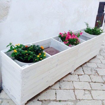 A paired whitish Pallet planter for the garden